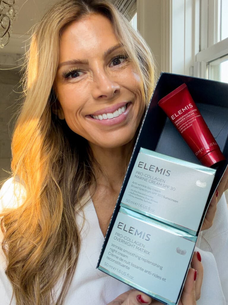 Corrine holding Elemis gift set 1